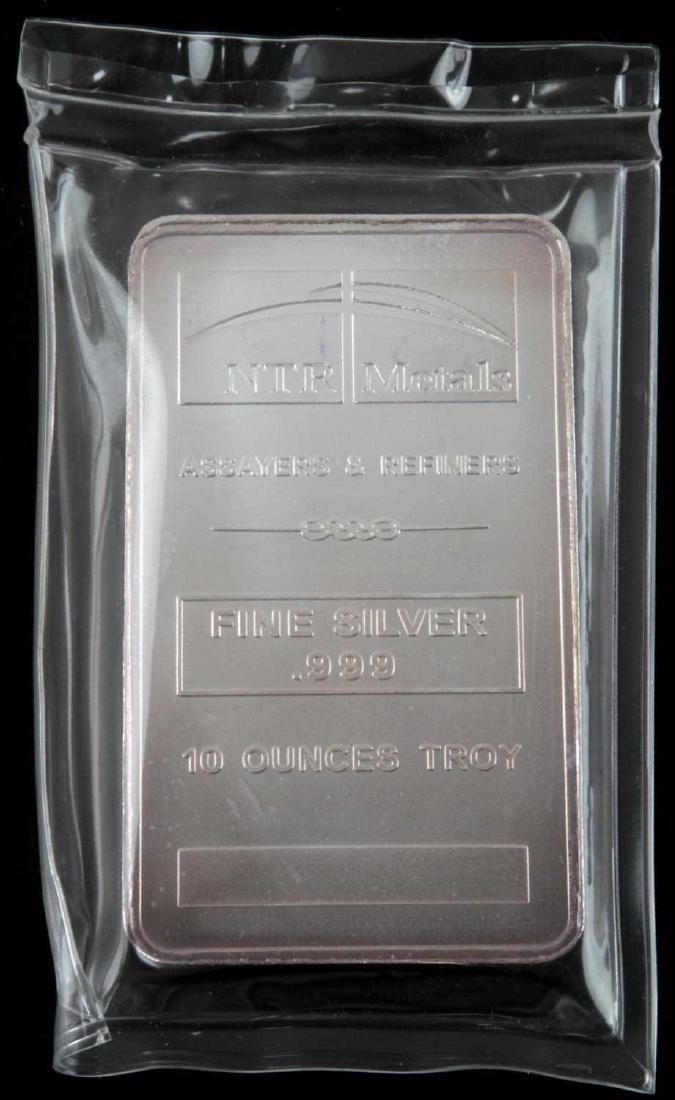 NTR METALS 10 TROY OUNCE .999 FINE SILVER BAR: NTR Metals Assayers & Refiners minted 10 Ounces Troy .999 Fine Silver Bar. Weighed and electronically tested; sealed in plastic.