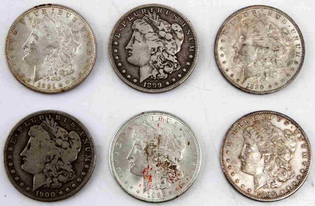 6 MORGAN SILVER DOLLAR COIN LOT 4 ARE UNC: Dates and grades as follow1889 UNC, 1896 UNC, 1890 O F, 1900 O F, and 2 uncirculated 1921's.