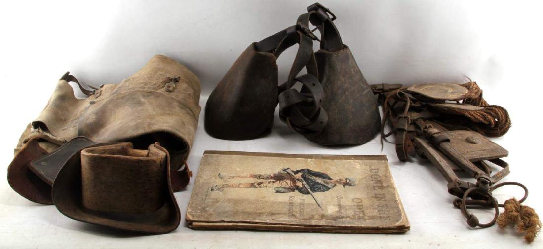 ANTIQUE COWBOY CHAPS U.S. BRIDLE 1903 REMINGTON: Includes 1903 "Done in Open" sketch book, heavy wear, pair of batwing chaps with ranch brand 38 inches from top of belt to bottom of chap, U.S. Cavalry mule bridle, a pair of hooded wood stirrups and 