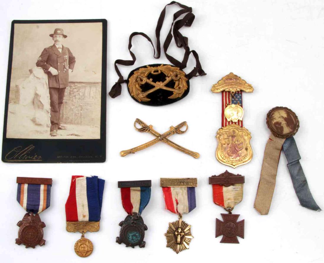 LOT OF CIVIL WAR REUNION MEDALS CDV & BADGES: This lot also includes a Sons and Daughters of Liberty also Sons of Civil War veterans, Named Chaplain medal from Bronx County, veteran in CDV photograph, crossed saber badges and more. NMRM34
