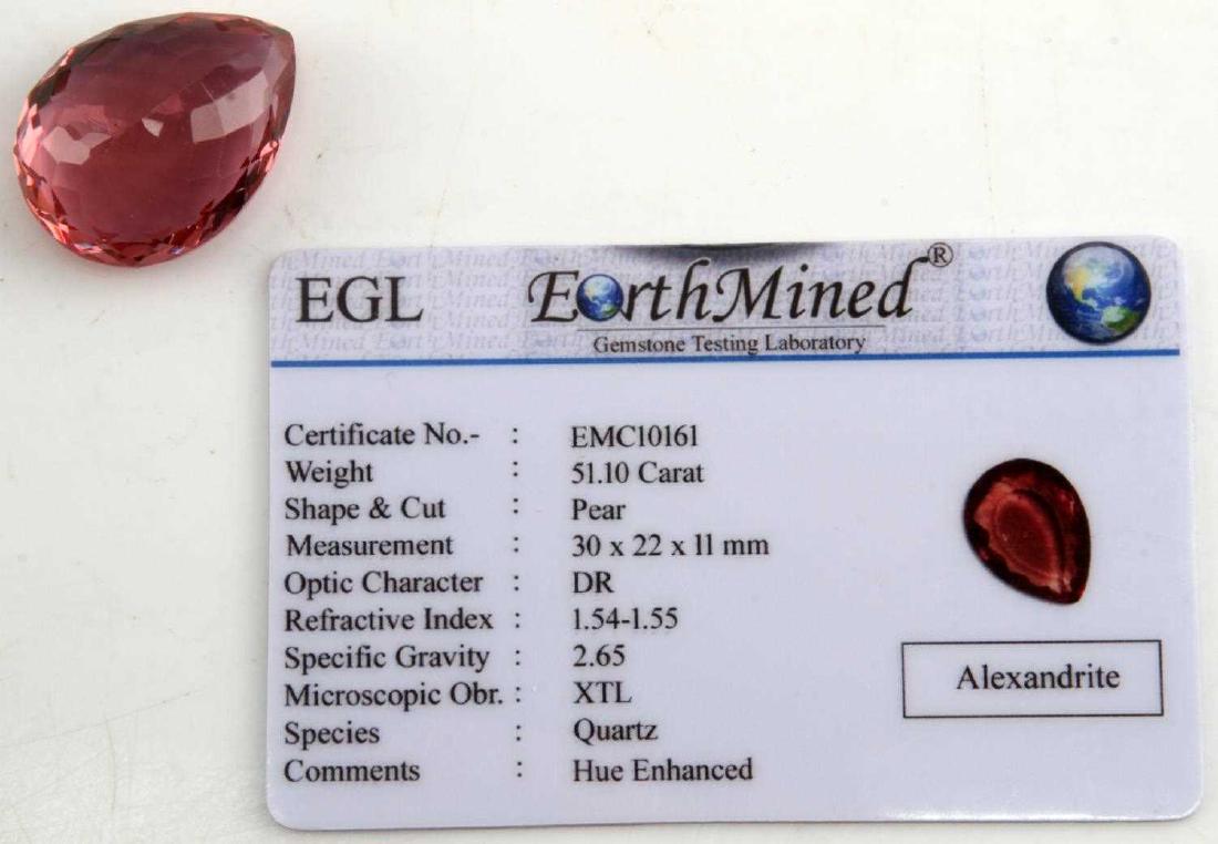 51.1 TCW LOOSE LAB MADE ALEXANDRITE PEAR SHAPED: Good color, clarity and luster. Multi-faceted. Measures 30 X 22 X 11mm. Descriptive card included.