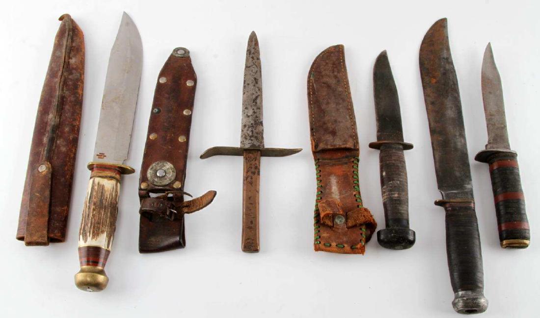 GROUP OF 5 KNIVES KNIFE WWI WWII USN TRENCH MORE: Lot includes: USN knife by H. Boker & Co., WWI trench art knife, large bowie knife (Rigid) with stag grip by Rostfrei Italy, one Marbles bowie knife with wrapped leather grip, and one smaller knife wi