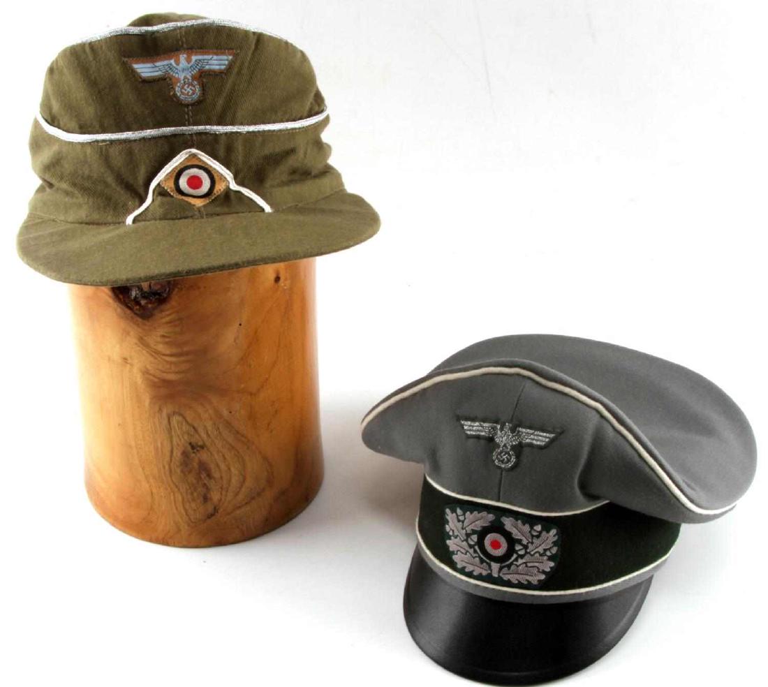 WWII GERMAN REENACTORS HEER OFFICER CAP LOT OF 2: This lot includes 2 officer caps. 1 is a peak cap and the other is a M43 field cap with silver bullion wire piping. Both caps are roughly size 7.5. Peak cap is marked "Emil S Ssebeler, Berlin No 55, g