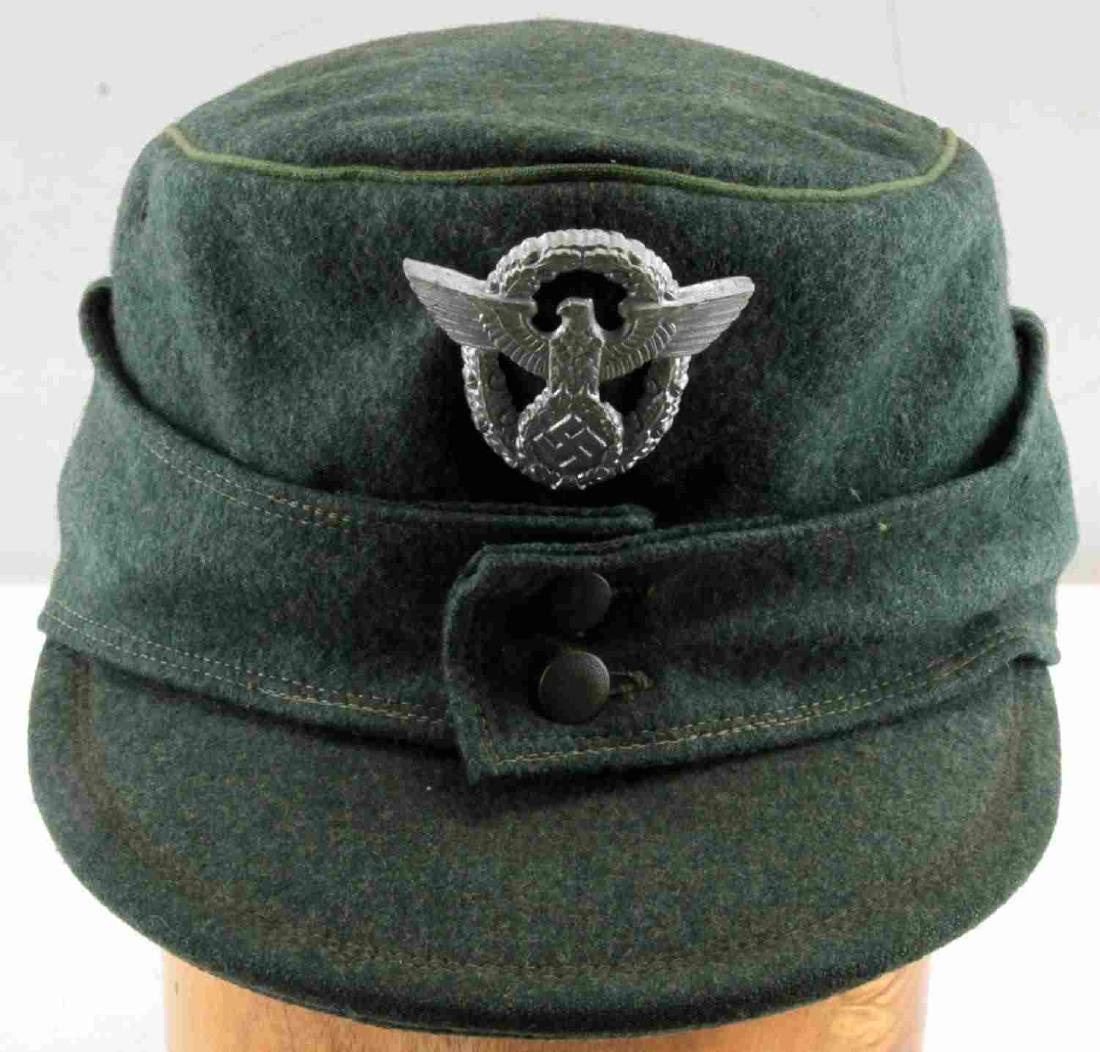 WWII GERMAN THIRD REICH WEHRMACHT M43 FIELD CAP: This is a nice German enlisted field cap with cap eagle. The leather lined interior is marked "Deutsh Industrie". It does not fluoresce under black light and is in very good condition. Some fading and