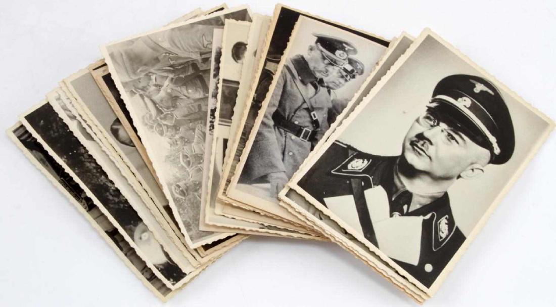 24 WWII GERMAN THIRD REICH HIMMLER PHOTO LOT: Group of 24 photos with images of Heinrich Himmler from Ukrainian "closed for public" archives. Some age wear. Stampings and handwriting on reverse. Unauthenticated. Sold "as is". Very good condition.