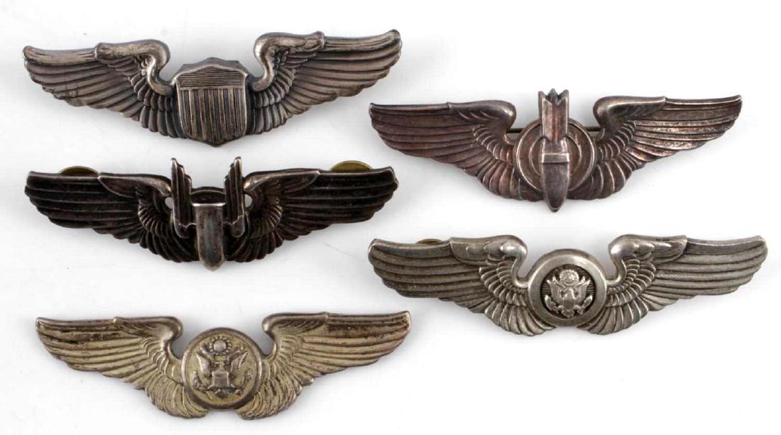 5 STERLING WWII AIRBORNE AIR CREW AVIATOR WINGS: Lot of 5 mixed WWII United States wings. Measure on average 3 inches in length. Most in original condition. Includes Aircraft Pilot, Bombadier, Aircrew (1941-47) - with missing pin and Aircrew (1947-d