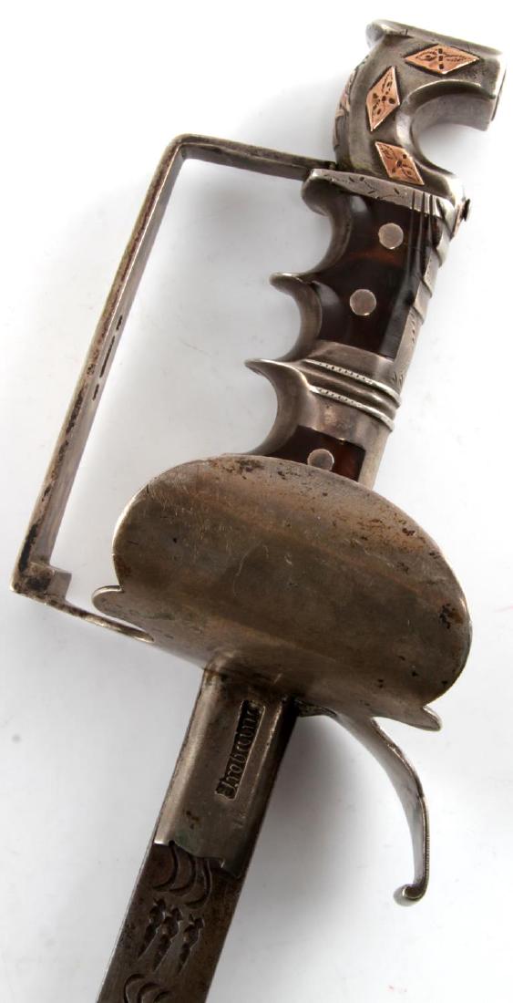 ANTIQUE MEXICAN SECOND EMPIRE GOLD SILVER SWORD: Presentation sword with solid silver guard and hilt. Has gold highlight decorations on the pommel. Grips are tortoise shell. Signed by silversmith and engraver on the guard and ricasso. Decorations in