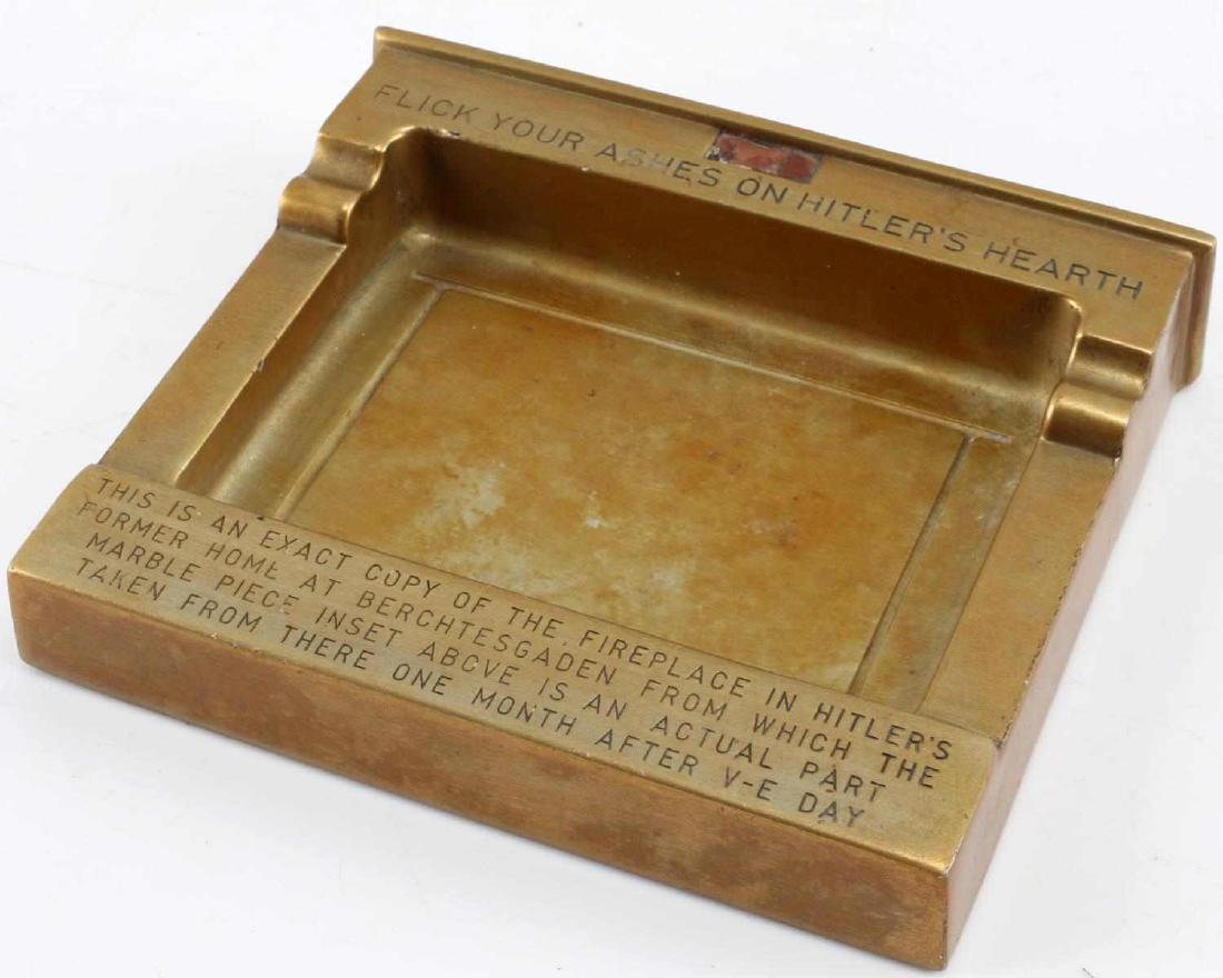 WEATHERHEAD FLICK YOUR ASHES ON HITLERS HEARTH: A curious souvenir. As the piece states, this is an exact copy of Adolf Hitler's fireplace. The marble piece inset at the top is a part taken from his personal fireplace. Signatures of the soldiers in