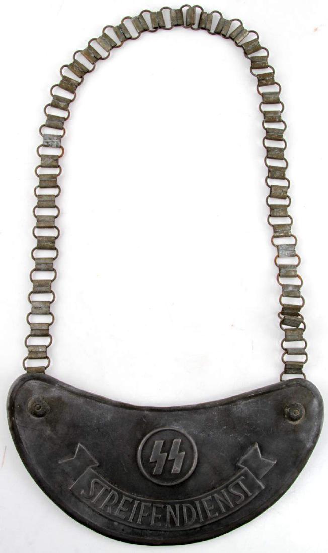 WWII GERMAN THIRD REICH SS STREIFENDIENST GORGET: SS Streifendienst gorget. Unpolished nickel construction with steel hooks and chain. In very good condition overall. RZM markings on hooks and back of gorget. Unauthenticated/Sold 'as is'