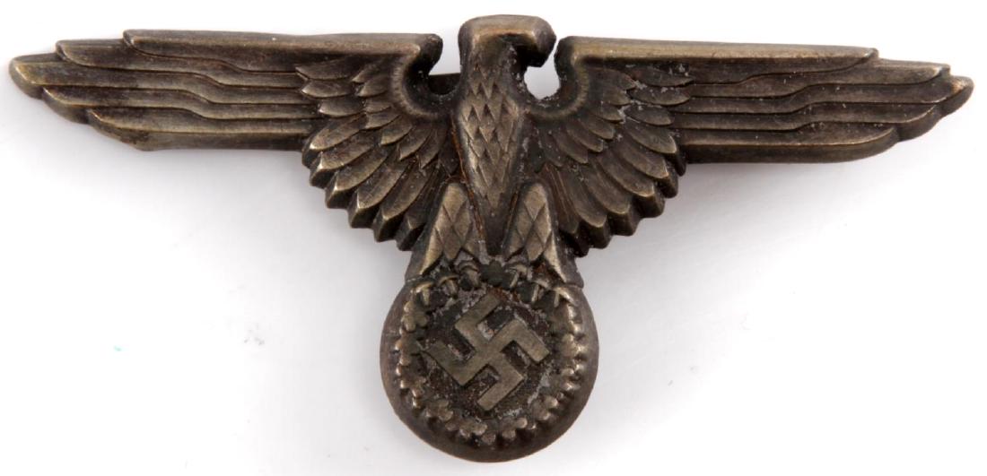 WWII GERMAN THIRD REICH REICHSADLER CAP BADGE: German Reichsadler cap badge. Marked 'RZM M1/34' on the inside of the right wing. Measures 2 3/4 inches in wingspan. In very good condition.