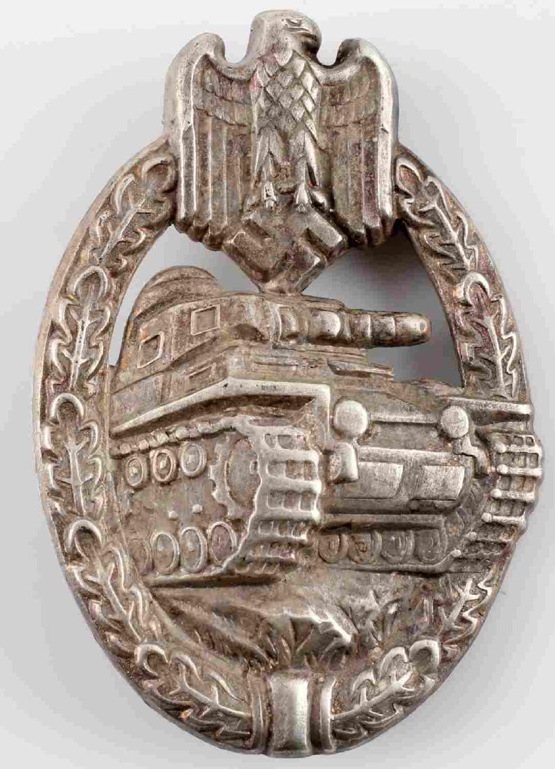 WWII GERMAN 3RD REICH PANZER SILVER ASSAULT BADGE: WWII German Third Reich Panzer Assault badge in silver. Item is in good condition for its WWII age and has no signs of damage or deterioration beyond expected aging. Stamped nickel construction, with 