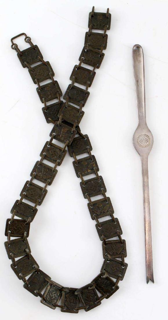 GORGET CHAIN & LOBSTER FORK BETRIEBSGES HOTEL: NSDAP gorget chain. Marked M 1/17 on each end piece. Measures 24 inches. In very good condition. Lobster fork from Hotel Betriebsges m.b.H. Inscribed with GEBR.HEPP 90 with name of Hotel. Swastiki ins