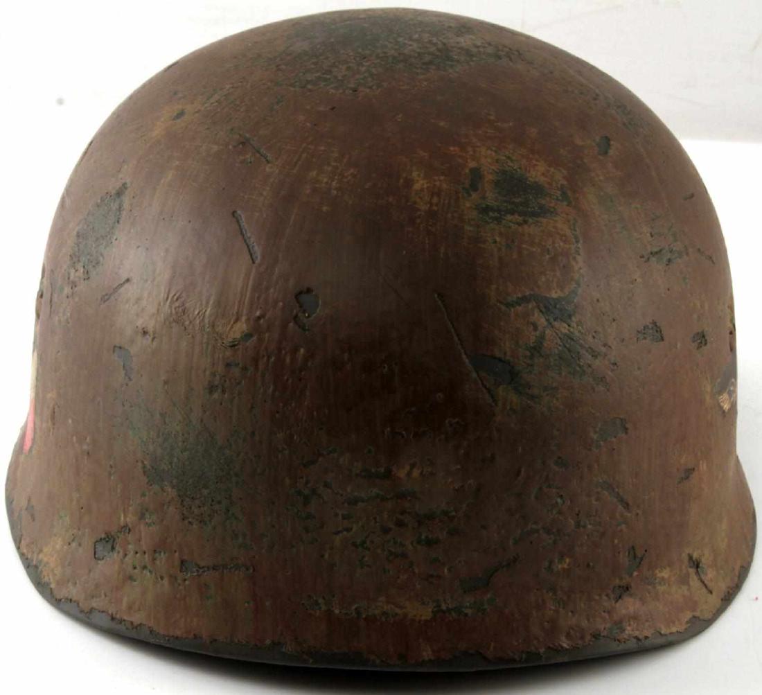 WWII GERMAN THIRD REICH M1938 PARATROOPER HELMET: M38 Fallschirmjäger helmet with spanner bolts and double decals. Inside liner is in very good condition. No maker stamps or marks can be found. Helmet has a thick camouflage layer painted on top.