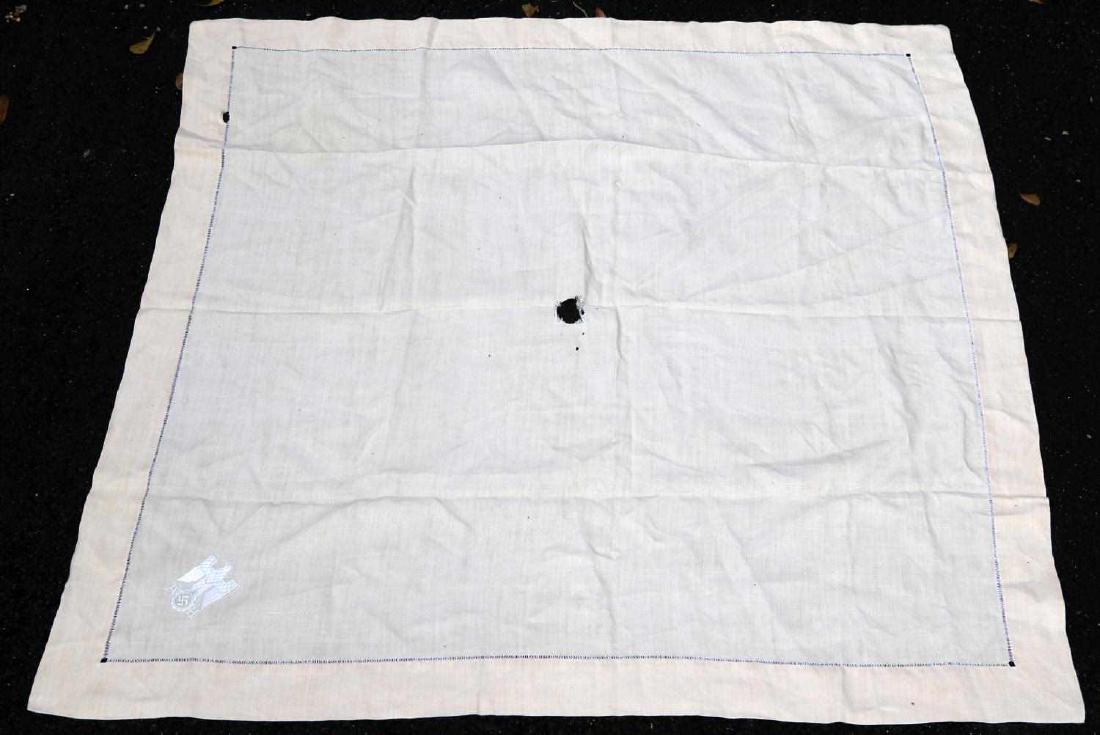 WWII GERMAN ADOLF HITLER PERSONAL TABLECLOTH: This tablecloth comes from the personal collection of Adolf Hitler and was part of his dinner set. His Reichsadler "A H" monogram is present on one of the corners. It measures 39.75"X 37.75". One hole