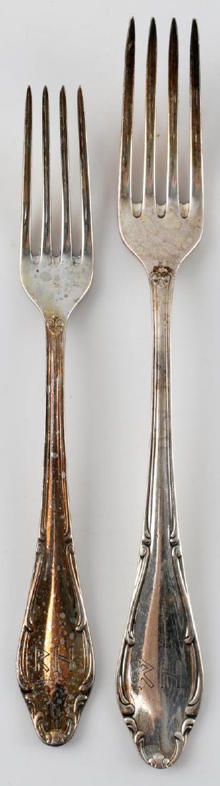 WWII GERMAN REINHARD HEYDRICH PERSONAL SILVERWARE: This lot includes 2 forks from the personal collection of Reinhard Heydrich. The forks bear his infamous "R H" monograms and are marked "Wellner Patent 90 45" on their reverse. They measure just over 