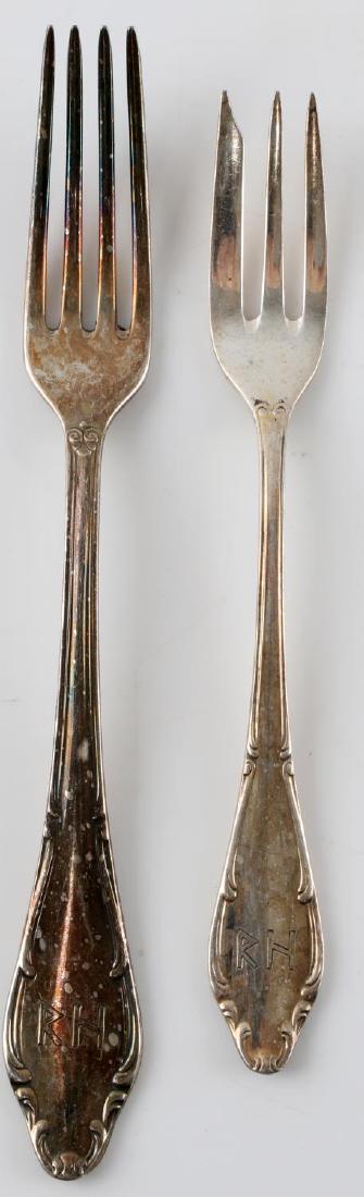 WWII GERMAN REINHARD HEYDRICH PERSONAL SILVERWARE: This lot includes 2 forks from the personal collection of Reinhard Heydrich. The forks bear his infamous "R H" monograms and are marked "Wellner Patent 90" on their reverse. They measure 7.25" and 6.2