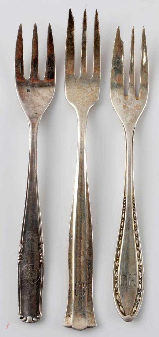 WWII GERMAN ADOLF HITLER & EVA BRAUN SILVERWARE: This lot includes 3 forks. 1 is from the personal collection of Adolf Hitler and has his "A H" monogram. It is reverse marked AWS Wellner with elephant 100. 1 is from the personal collection of Eva Br