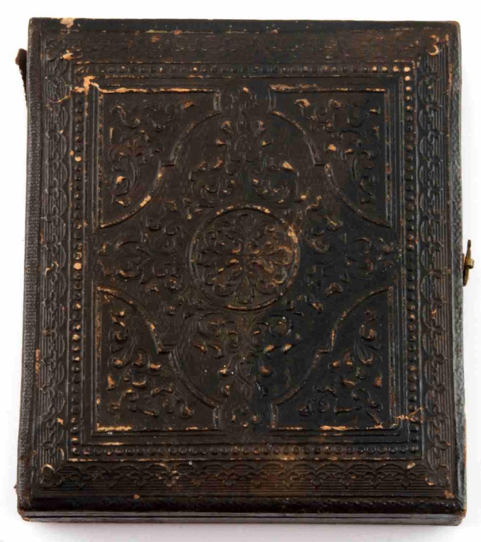 AMERICAN CIVIL WAR UNION SOLDIER AMBROTYPE PHOTO: Ambrotype of a Union soldier dressed in a cavalry uniform. Included is a note from the Department of Interior from the early 20th century describing how to endorse a pension check, with a handwritten 