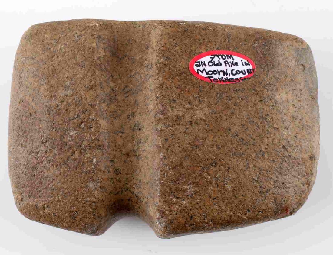 NATIVE AMERICAN GROOVED STONE AXE MOORN TENNESSEE: Grooved Native American stone axe head. Found in Moorn Co. Tennessee. Measuring approximately 5 inches by 3.5 inches. In very good condition.