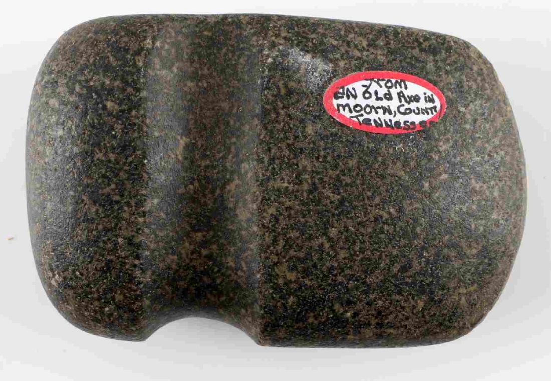 NATIVE AMERICAN GROOVED STONE AXE MOORN TENNESSEE: Grooved Native American stone axe head. Found in Moorn Co. Tennessee. Measuring approximately 4.25 inches by 3 inches. In very good condition.