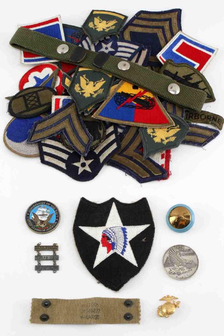LOT OF US MILITARY SLEEVE PATCHES WITH FEW PINS: Lot includes: rank chevrons, US Army 2nd Infantry Indian head patch, 3rd armored division, specialist, special forces Airborne, blue and red 69th division and more. Very good condition.
