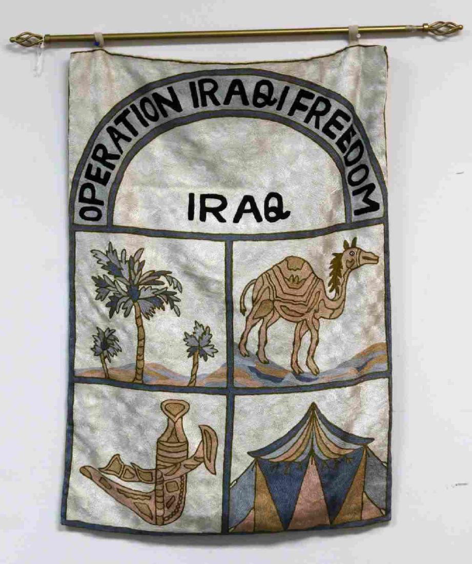 OPERATION IRAQI FREEDOM WOVEN TAPESTRY BANNER FLAG: This is a 34" X 23.5" Operation Iraqi Freedom flag featuring embroidered camel and palm trees over an ornate woven tapestry. Very good condition overall.