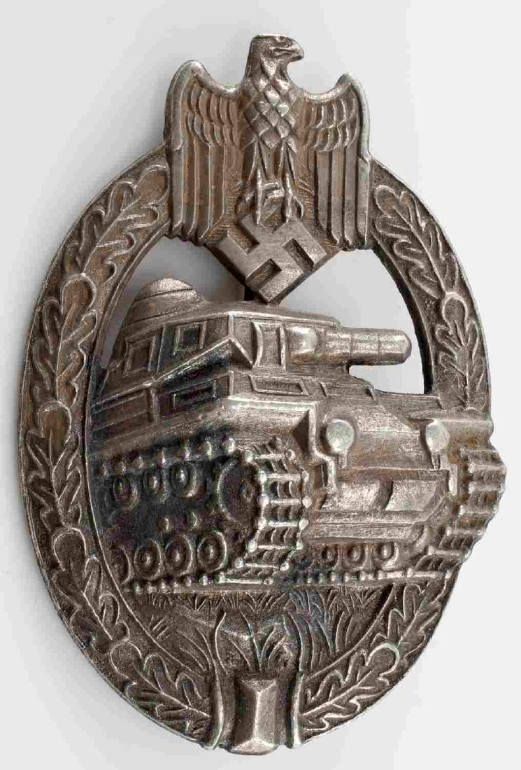 WWII GERMAN 3RD REICH SILVER PANZER ASSAULT BADGE: Silver panzer assault badge. Is solid type construction with ball catch thin vertical pin. Marked SA inside triangle on reverse. Very good condition overall with slight patina present. This lot has a 