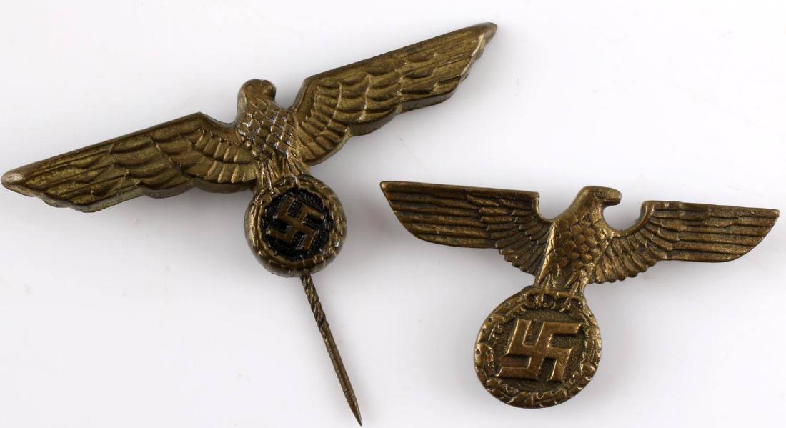 WWII GERMAN NAVY EAGLE STICK PIN LAPEL BADGE LOT: This lot includes 1 WWII German Gilt Navy Eagle Stick Pin Lapel Badge and 1 WWII German Reichsadler badge. Very good condition overall with some patina present. Badge is marked RZM M 1/76 on reverse.
