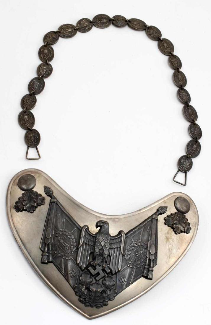 WWII GERMAN 3RD REICH ARMY STANDARD BEARER GORGET: This is a nice German Heer standard bearer's gorget. Its center prong is marked H Aurich Dresden. Has complete Reichsadler oak leaves chain with round center link. Heavy patina and signs of abrasions