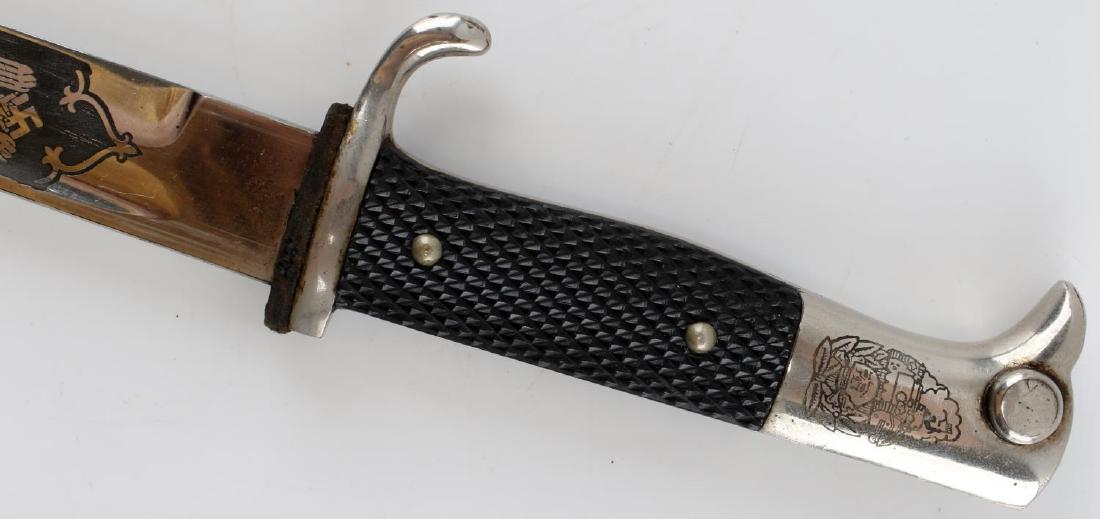 WWII GERMAN ARMY PANZER ETCHED DRESS BAYONET: Army Panzer long dress bayonet with etched "Zur Erinnerung an meine Dienstzeit" (In memory of my service time.) It is also etched on its hilt with a panzer, a totemkopf, oak leaves, and a man waving a