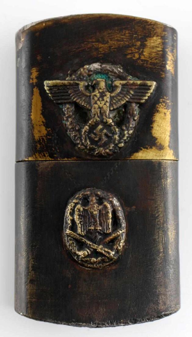WWII GERMAN THIRD REICH GENERAL ASSAULT LIGHTER: Cigarette lighter with the General Assault Badge emblems on it. Brass construction. Measures 2 1/2 inches in height. In very good condition. Unauthenticated/Sold 'as is' This lot has a reserve.