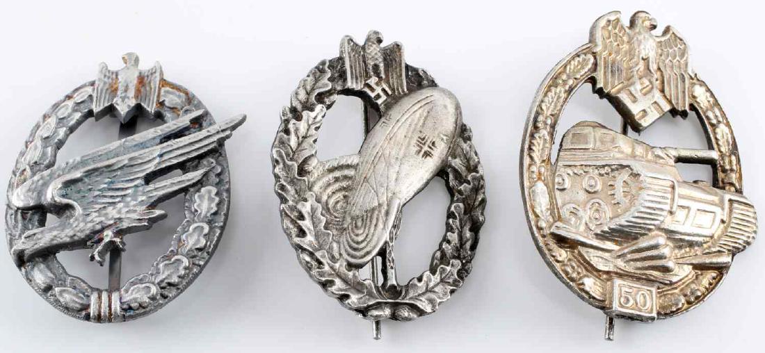 WWII GERMAN THIRD REICH WEHRMACHT HEER BADGE LOT: Lot of three Heer badges. One 50 Panzer Assaults Badge, one Balloon pilot badge, and last is an Army paratrooper badge. All are in very good condition. Unauthenticated/Sold 'as is' This lot has a rese