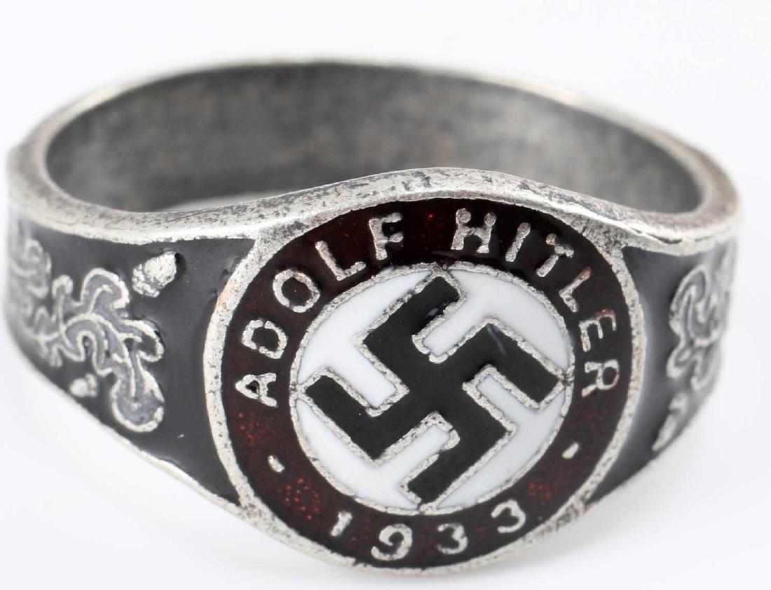 WWII GERMAN THIRD REICH ADOLF HITLER 1933 RING: Adolf Hitler 1933 silver ring. Has silver and maker marks. Shape is slightly distorted. In very good condition. Unauthenticated/Sold 'as is'. Weighs 6.4 grams. This lot has a reserve.