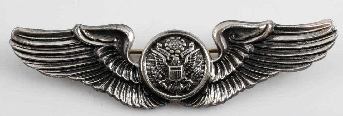 USAAF WWII ARMY AIRFORCE AIR CREW WING PIN BADGE: USAAF WWII Army Air Force air crew member wing pin badge. Measures 3 inches wide by 13/16 inch tall. Reverse is maker marked "Meyer Inc New York" and "Sterling".One piece silver construction. Very goo
