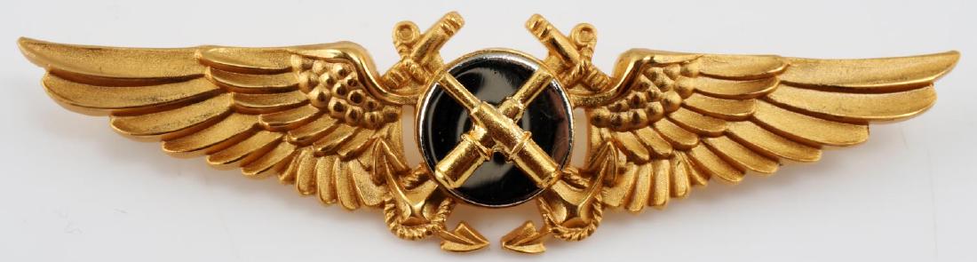 USN WWII NAVAL AVIATOR TACTICAL WING BADGE: USN WWII Naval Aviator Tactical Wing. Measures 2 3/4 inches wide by 11/16 inch tall. Reverse is maker marked "NS Meyer Inc New York". Brass and nickel construction. Very good condition. Unauthenticate