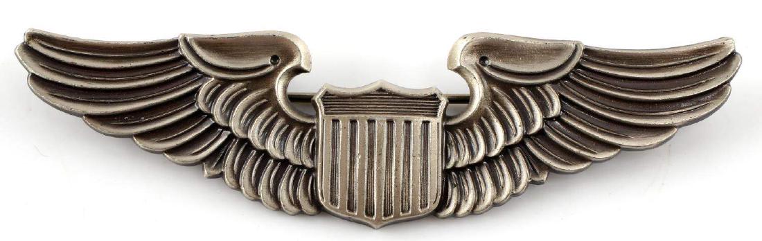 USAAF WWII ARMY AIR FORCE PILOT WING BADGE STERLIN: Pilot wings with shield to center. Meyer New York logo shield to back along with 'sterling.' Measures 3 1/8 inches long. Very good condition.
