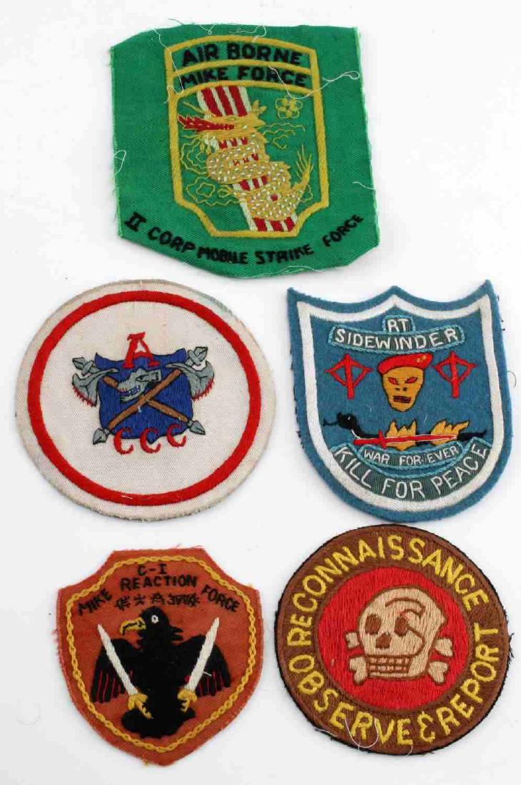 US VIETNAM ERA ARMY SPECIAL FORCE PATCH LOT: 5 US Vietnam era Special Forces and Mike Force patches. They measure about 4 inches wide by 4 inches tall. Hand and machine embroidered on cotton backing. Very good condition.