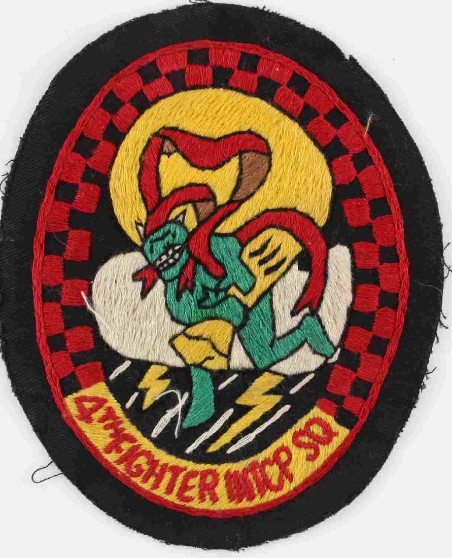 US ARMY AIR FORCE 4TH FIGHTER INTCP SQUAD PATCH: US Army Air Force 4th Fighter Intercept Squadron patch. Theater made and measuring 4 1/4 inches by 5 3/16 inches. In very good condition.