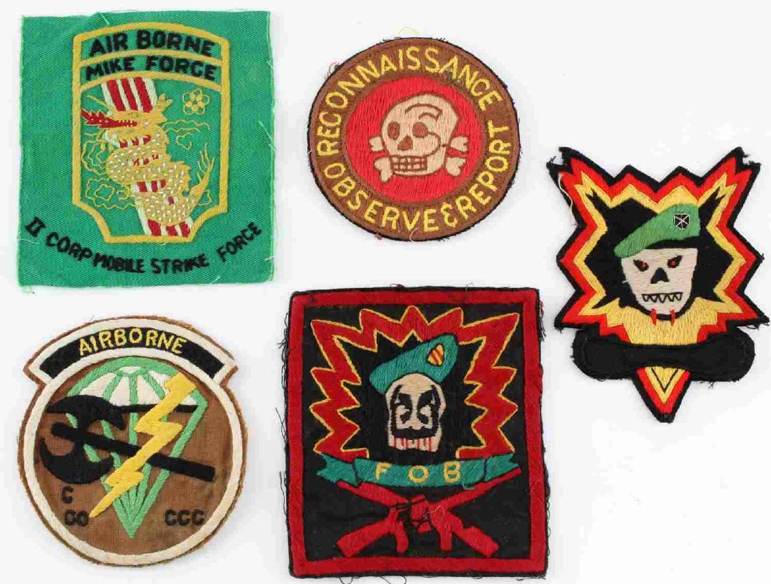 ARMY VIETNAM WAR SPECIAL FORCES & RECON PATCH LOT: Lot of five shoulder patches of the US Army from the Vietnam War era, including 5th Special Forces, Mike Force, Reconaissance Observation & Report, Airborne C Co CCC, and Green Beret 5th Special Force