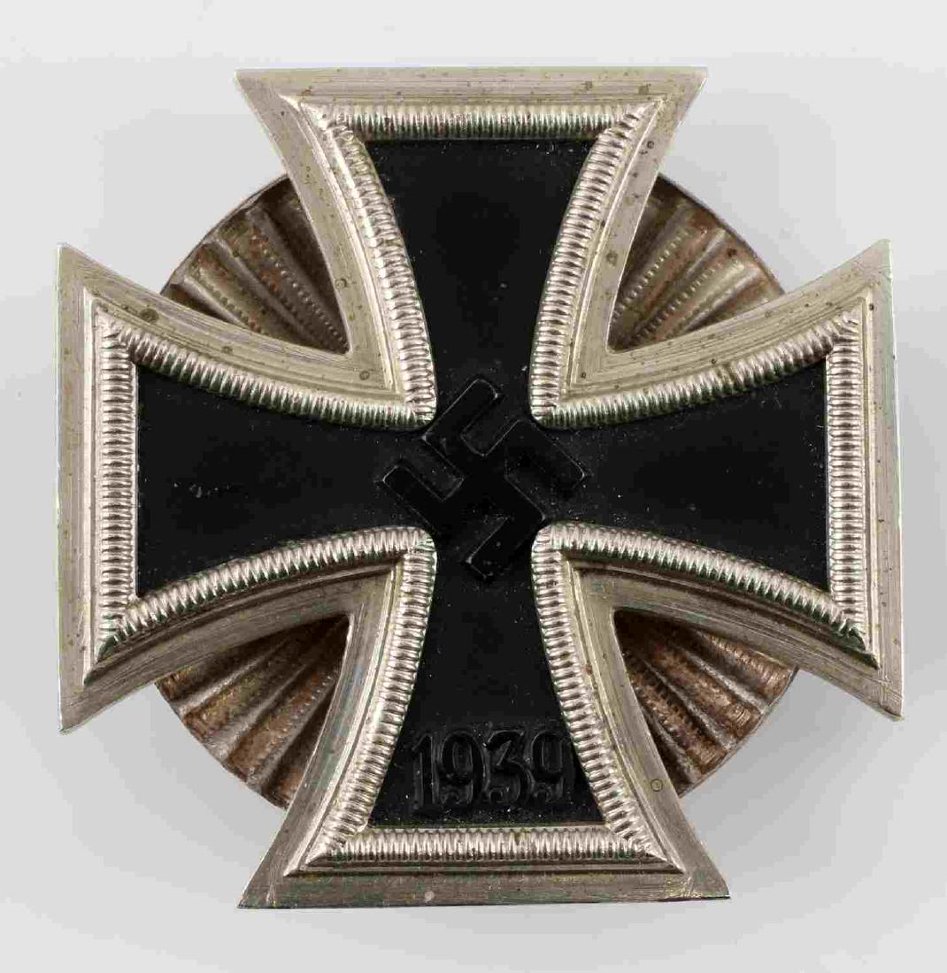 GERMAN WWII 1ST CLASS IRON CROSS 1939 SCREW BACK: Three piece construction with iron magnetic center. Clam shell screw back. No maker's mark. Awarded for gallantry in action.