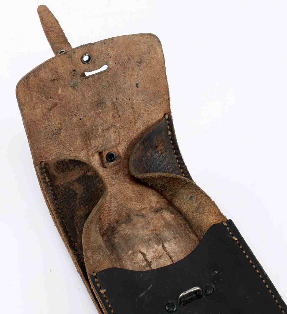 GERMAN WWII THIRD ARMY COMBAT LEATHER MAP CASE: German WWII Third Reich Wehrmacht combat leather map case. Measures about 4 inches wide by 10 inches tall. Reverse is maker marked "WaA 655". Machine sewn black leather construction. Very good conditi