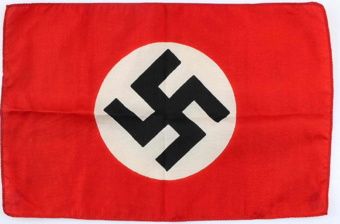 WWII GERMAN THIRD REICH NSDAP PARADE RALLY FLAG: Small handheld NSDAP flag likely for use at a parade. Measures 12 1/4 inches wide by 8 1/8 inches tall. One piece printed silk construction.