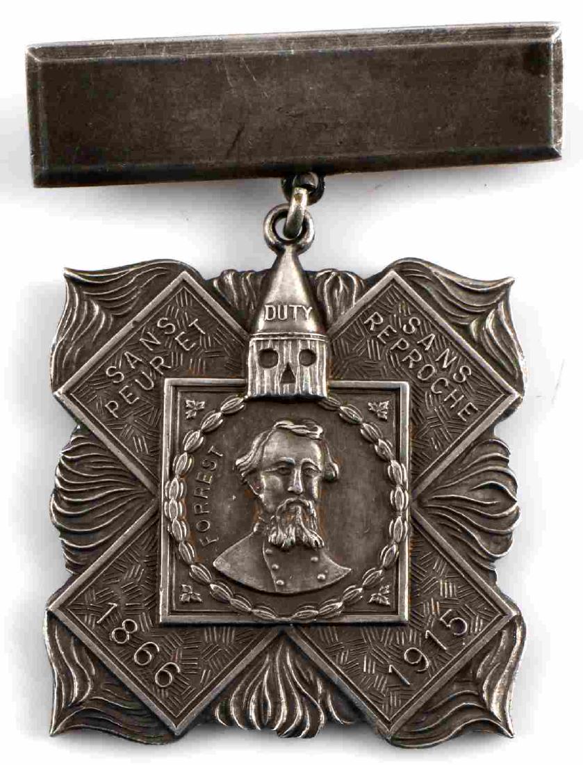 VINTAGE KU KLUX KLAN HERO CROSS 1915 NICKEL MEDAL: Measures 1 3/8” wide by 2 1/16” tall including the top mounting bar with a horizontal pin back. The front shows a bust image of ex Confederate General Nathan Bedford Forrest in the center. It read