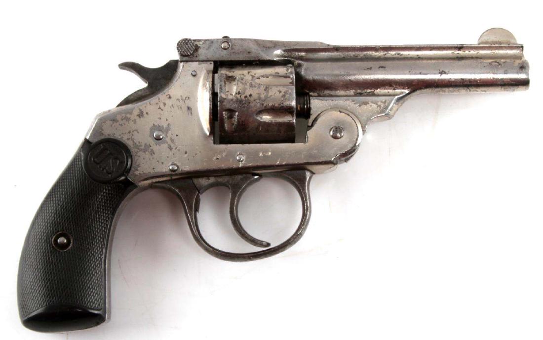 US TOP BREAK 7 SHOT REVOLVER IN .22 CALIBER: Nickel finish with much loss, U.S Revolver marked to top rib, 3 inch barrel with clear pitted bore, serial no. to trigger guard, US bakelite grips. Fair condition. Requires FFL or C&R for transfer. Ca