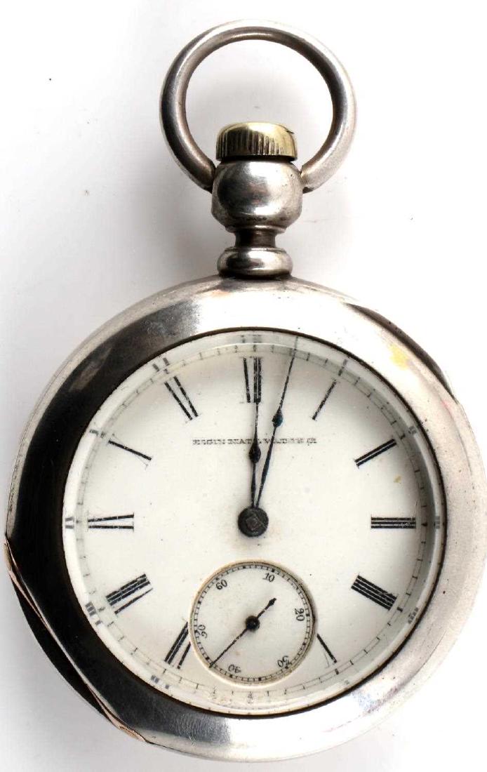 ELGIN PART CONDITION HID KEY SILVER POCKET WATCH: Elgin National key wound pocket watch. Key is hidden in the watch crown. The socket at the base of the key appears to have broken off. Movement is not functional and watch is being sold in parts condi