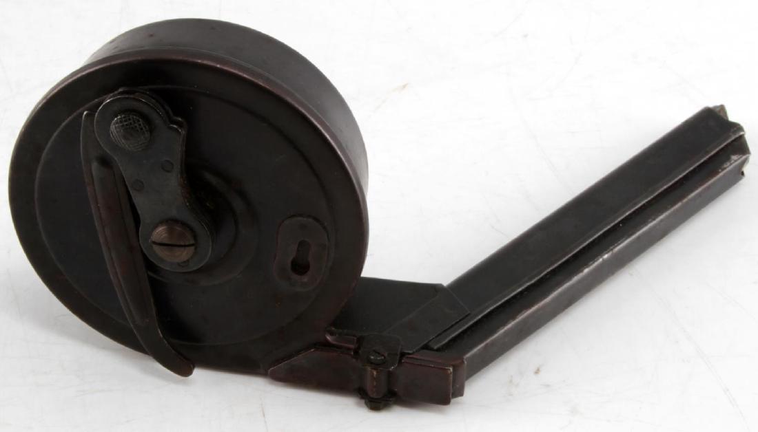 9MM LUGER ARTILLERY SNAIL DRUM MAGAZINE DISPLAY: For display only. WWII 32 round drum magazine. The following markings are stamped on: crown over MGC, 68, Waffenamt 1015. Measures 3.5 inches in diameter and extended magazine measures 6.5 inches. Ver