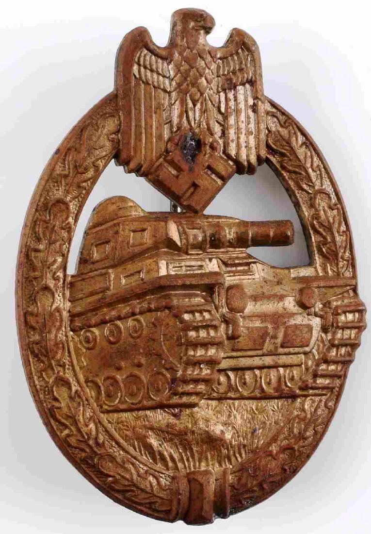 WWII GERMAN 3RD REICH PANZER ASSAULT BADGE BRONZE: Panzer Assault Badge - Bronze. Tank within an oval oak leaf wreath and eagle/swastika at the top. Solid variety. Dished reverse. Round vertical pin and marked RS&S on reverse. Very good condition over