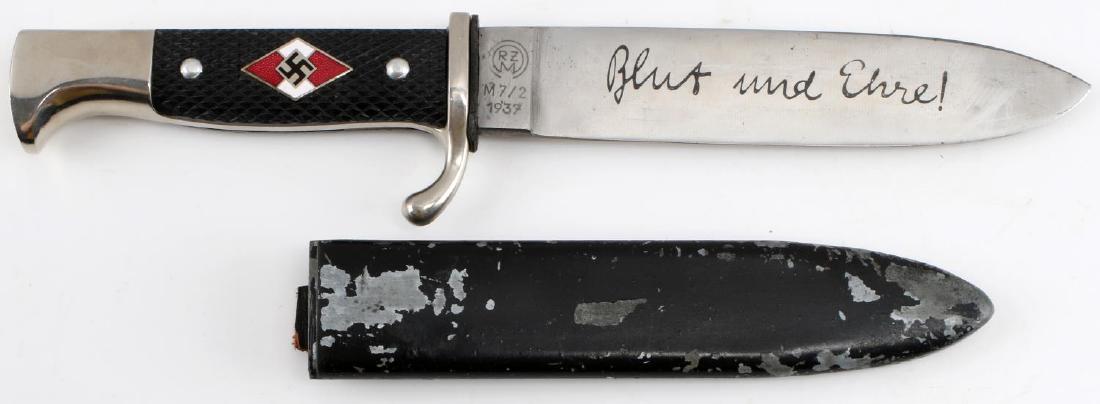 WWII GERMAN THIRD REICH HITLER YOUTH MEMBER DAGGER: Dagger of a member of the Hitler Youth. Has 'Blut und Ehre' etched in blade and 'RZM M7/2 1937' on the ricasso. Bakelite grips. Some paint wear on the scabbard and the leather hanger has broken off at