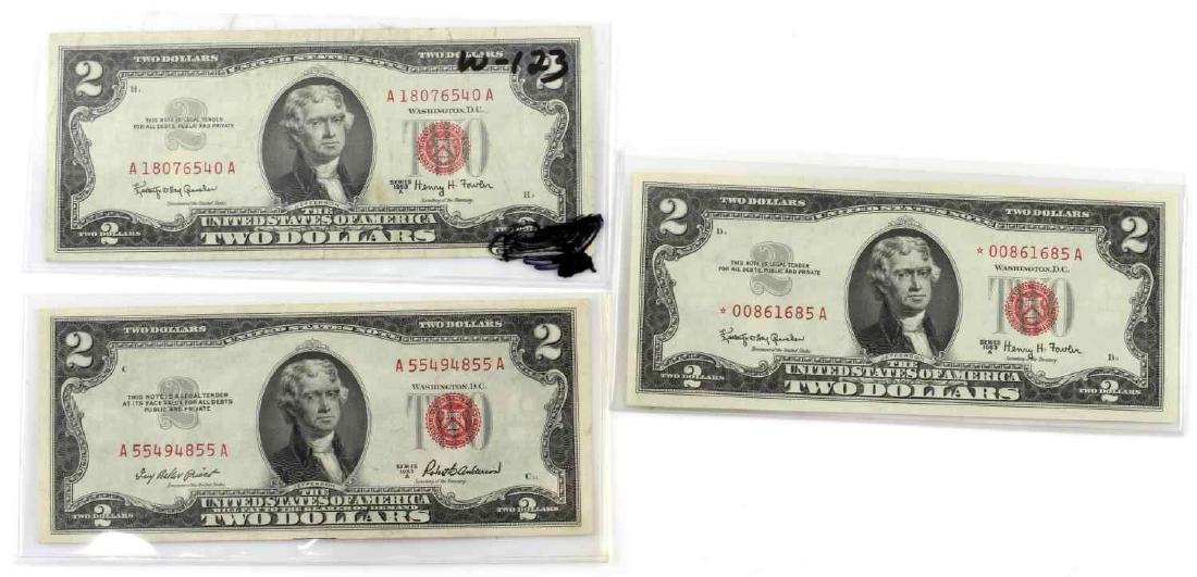 RED SEAL TWO DOLLAR US BANK NOTE LOT 1964 1953: Lot includes 3 $2 Red Seal Bank Notes. (FR1510, 1514, and 1514*) 2 rate as XF and 1 as VF+. Crisp with limited creasing. No holes and only slight fading present.