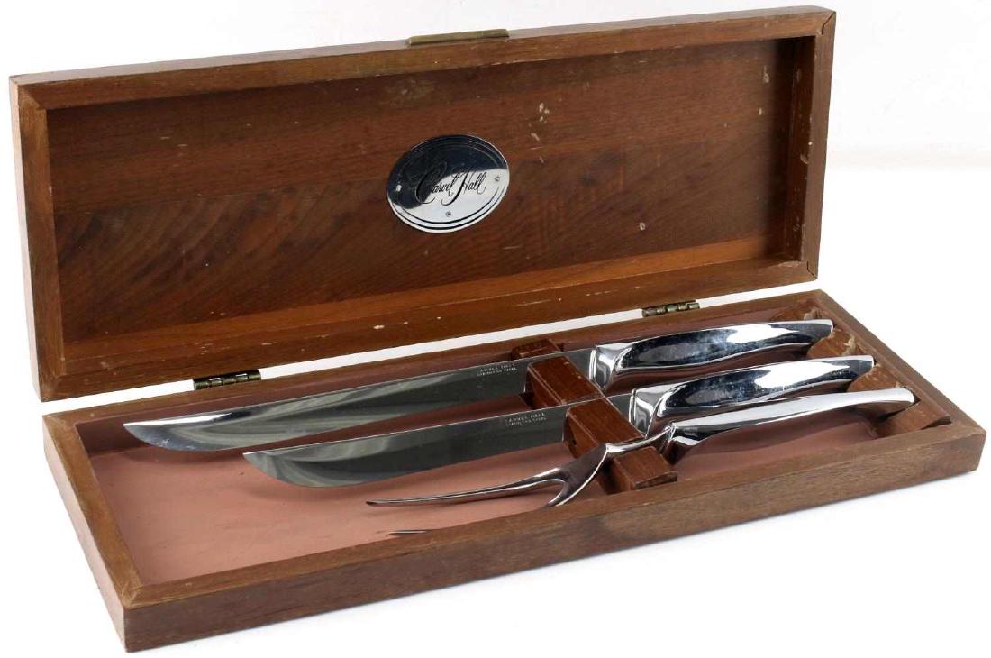 CARVEL HALL STAINLESS STEEL 3 PC CARVING KNIFE SET: Two knives and a fork for carving. First knife measures 14.25 inches, second measures 12 5/8 inches and fork measures 10 7/8 inches. Comes in wooden box with carved initials (BCB) to top.